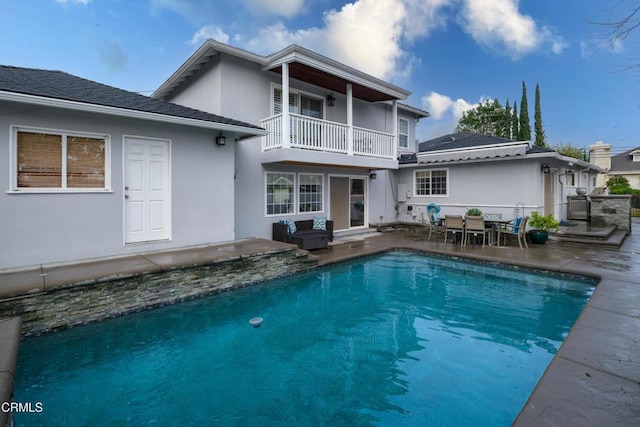 rear view of house with a patio area