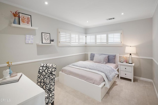 carpeted bedroom with crown molding