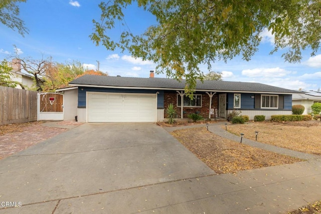 ranch-style home featuring a garage