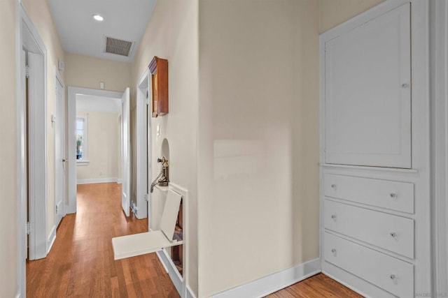 hall featuring light wood-type flooring