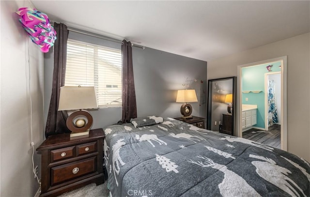 bedroom featuring ensuite bath