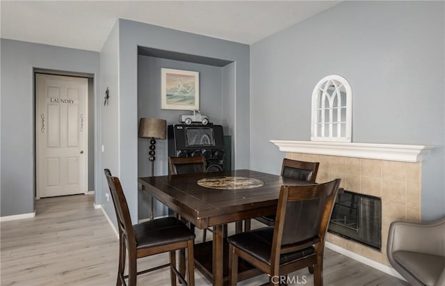 dining area with light hardwood / wood-style floors