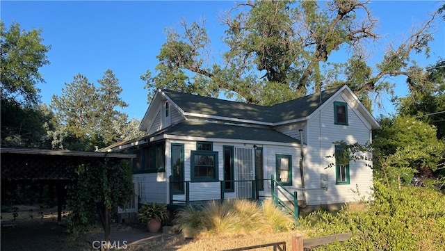 view of front of house with a carport