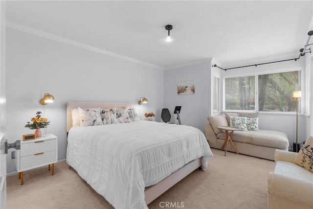 carpeted bedroom featuring crown molding