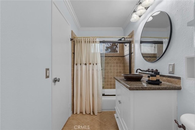 bathroom featuring tile patterned flooring, vanity, ornamental molding, and shower / bath combo with shower curtain