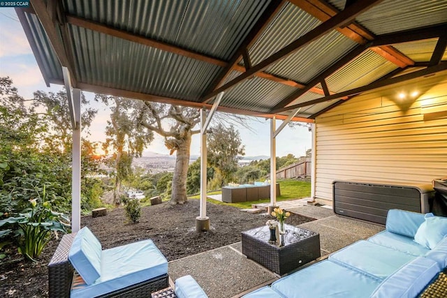 patio terrace at dusk with outdoor lounge area