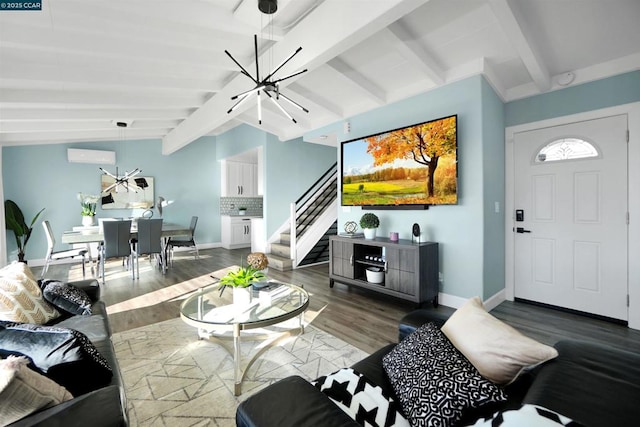 living room featuring lofted ceiling with beams, dark wood-type flooring, a wall unit AC, and an inviting chandelier