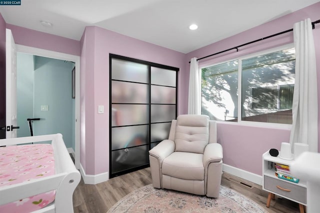 bedroom with light wood-type flooring