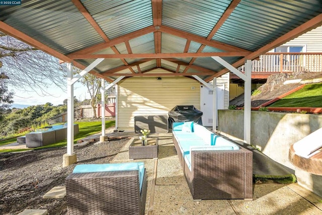 view of patio with a grill and outdoor lounge area