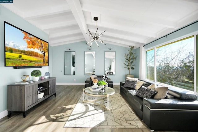 living room with hardwood / wood-style floors and lofted ceiling with beams