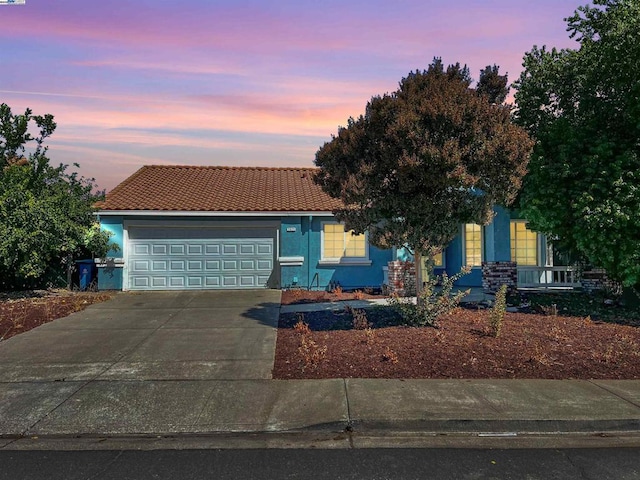 view of front of home featuring a garage