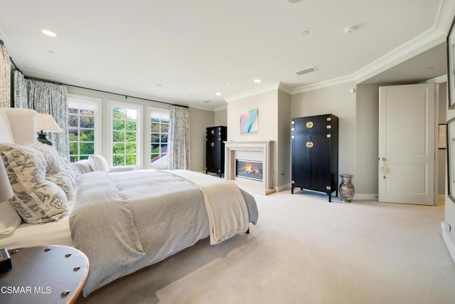 carpeted bedroom with ornamental molding