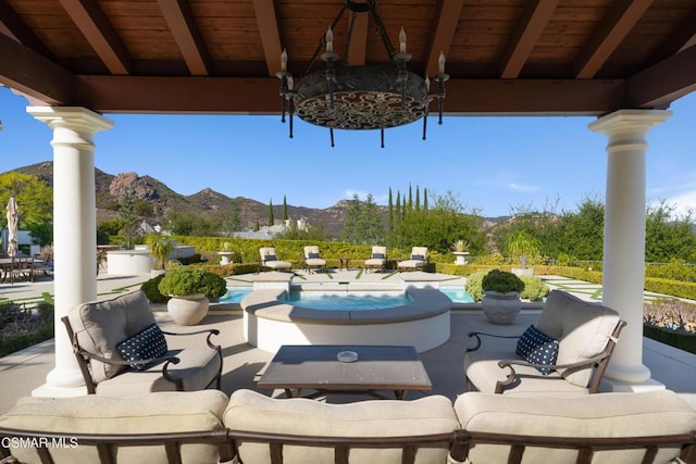 view of patio featuring a mountain view