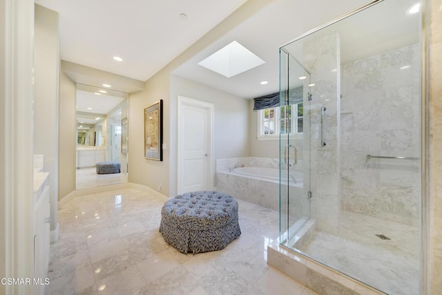 bathroom with vanity, plus walk in shower, and a skylight