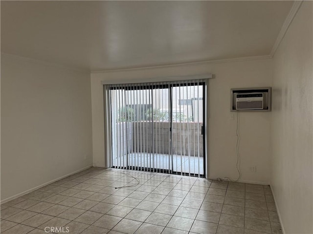 spare room with crown molding, an AC wall unit, and light tile patterned floors