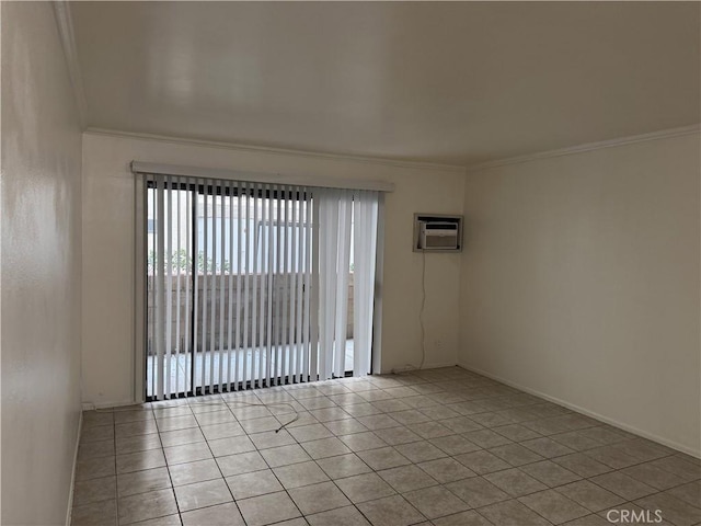 empty room with ornamental molding, a wall mounted AC, and light tile patterned floors