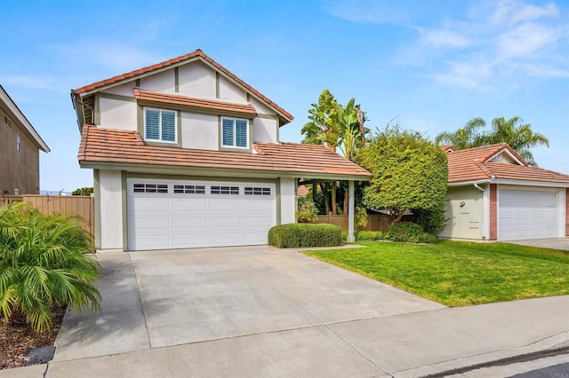 front facade featuring a garage and a front yard