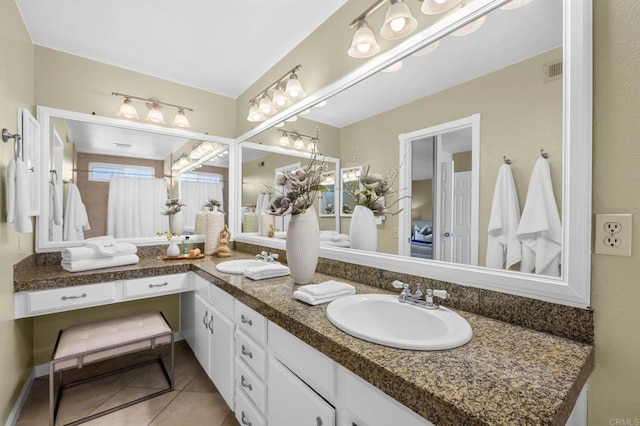 bathroom featuring vanity and tile patterned flooring