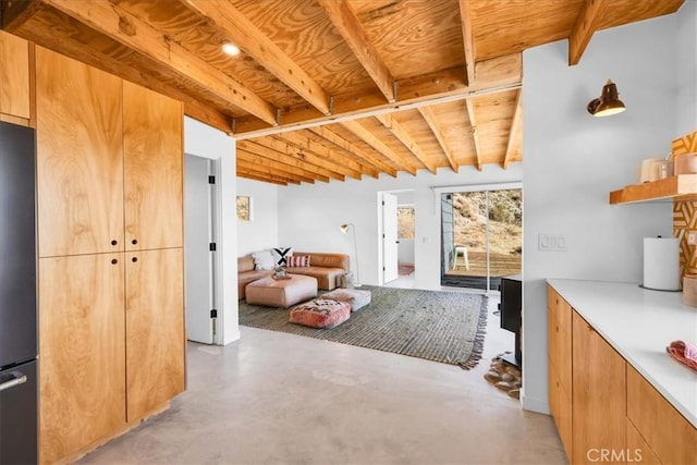 interior space featuring wooden ceiling and beam ceiling