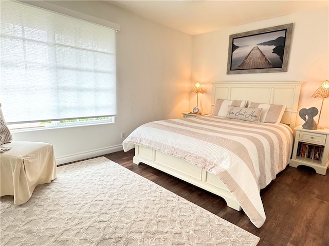 bedroom featuring dark hardwood / wood-style floors