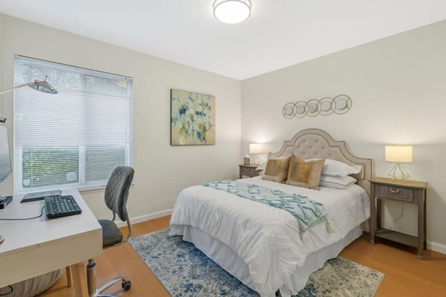 bedroom featuring light hardwood / wood-style floors