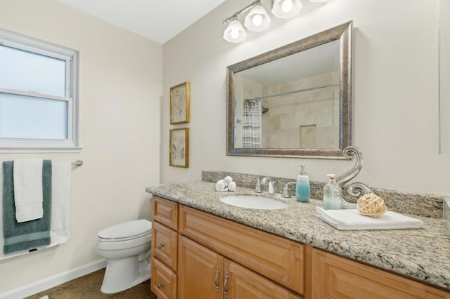 bathroom featuring vanity, toilet, curtained shower, and tile patterned flooring