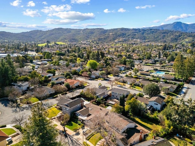 drone / aerial view featuring a mountain view