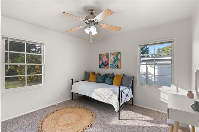 bedroom with ceiling fan and carpet