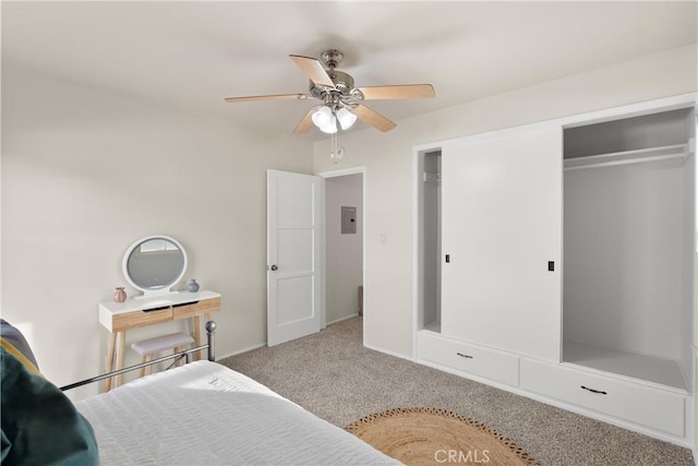 bedroom with carpet floors, a closet, and ceiling fan