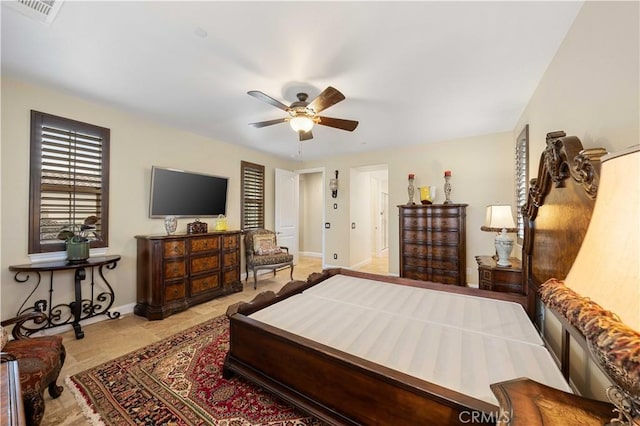 bedroom featuring visible vents, ceiling fan, and baseboards