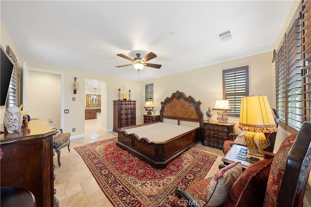 bedroom featuring baseboards, connected bathroom, visible vents, and a ceiling fan