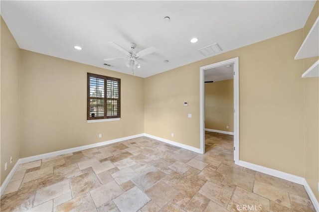 empty room featuring ceiling fan, recessed lighting, visible vents, baseboards, and stone finish flooring