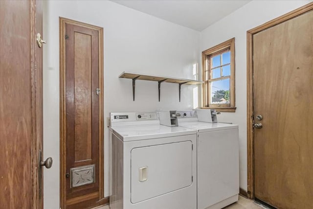 laundry room featuring separate washer and dryer