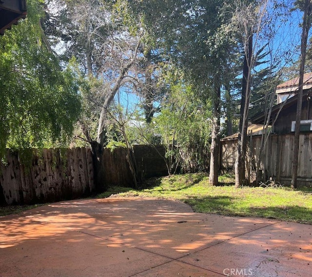 view of yard with fence