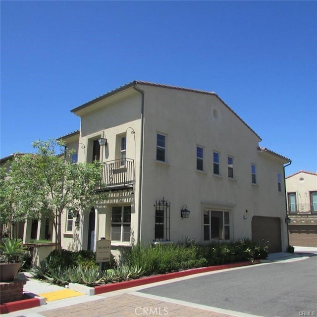 view of building exterior with a garage