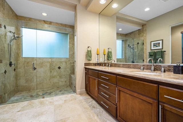 bathroom featuring vanity and walk in shower