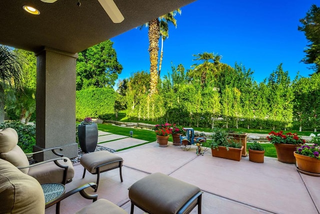 view of patio / terrace featuring ceiling fan