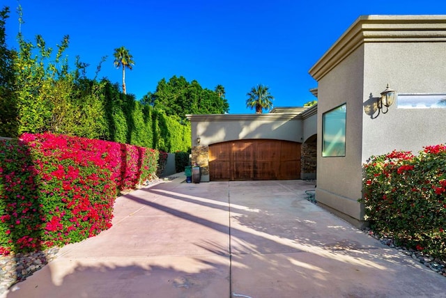 exterior space with a garage