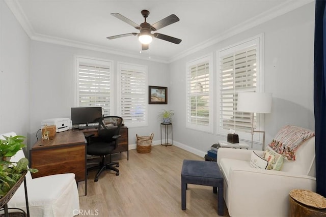 office space featuring ceiling fan, ornamental molding, and light hardwood / wood-style floors