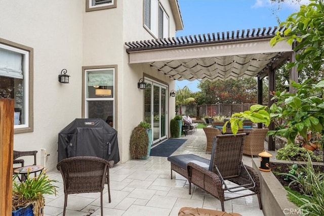 view of patio with a pergola and a grill