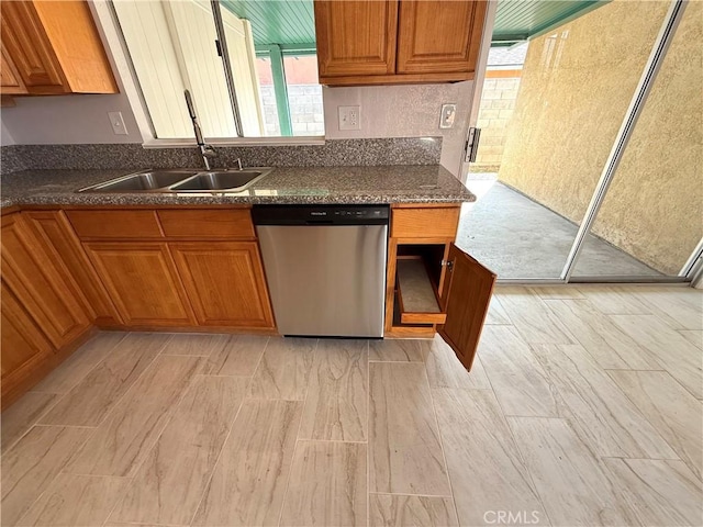 kitchen with stainless steel dishwasher and sink