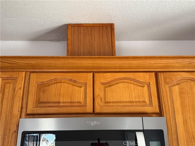 interior details with a textured ceiling