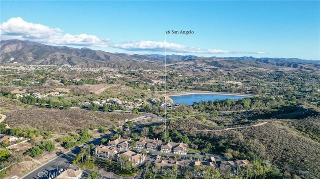 aerial view with a water and mountain view