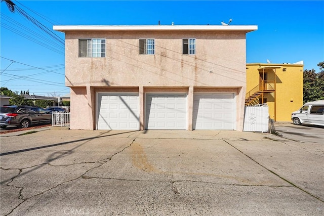 garage with fence