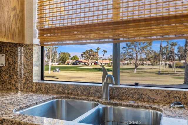 interior details with sink and backsplash