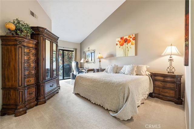 carpeted bedroom with access to outside and high vaulted ceiling