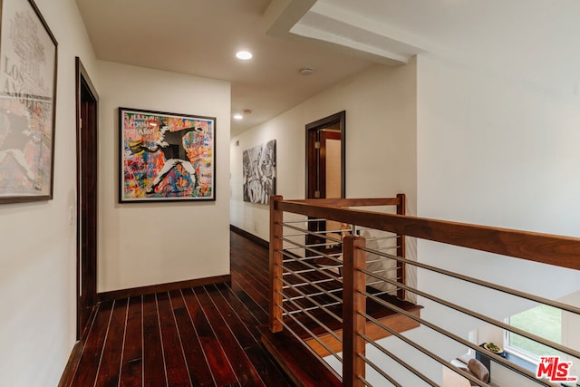 hallway featuring dark wood-type flooring