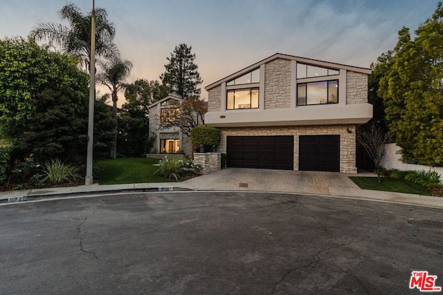 view of front of property featuring a garage