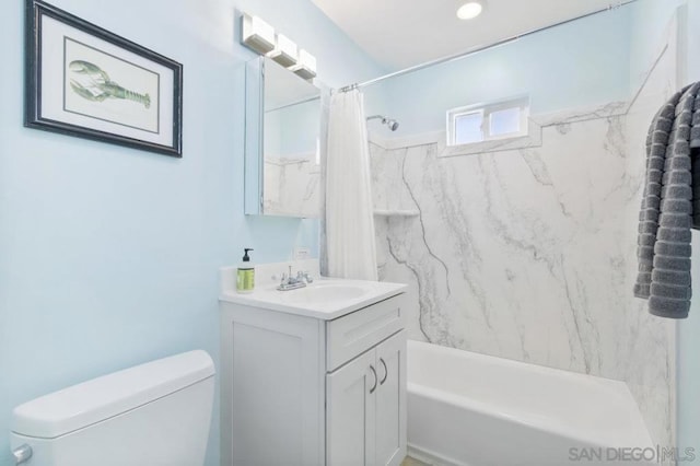 full bathroom featuring vanity, shower / bathtub combination with curtain, and toilet