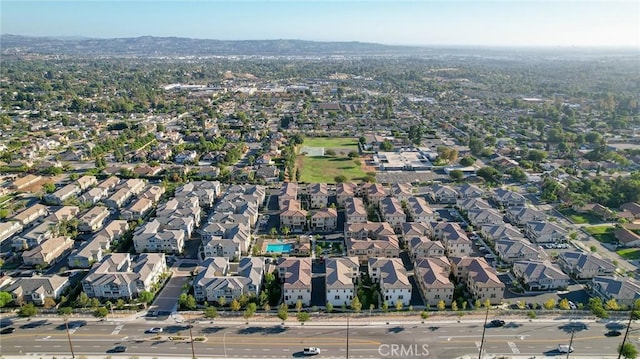 birds eye view of property featuring a mountain view